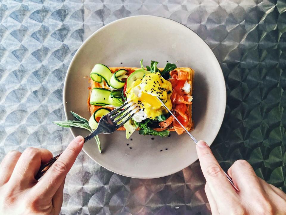 <p>When you sit down to eat, take a moment to physically divide your food in half before you begin eating. “Consider the divide a ‘speed bump,’” says <a href="https://amihungry.com/michelles-story/" rel="nofollow noopener" target="_blank" data-ylk="slk:Michelle May, M.D.;elm:context_link;itc:0;sec:content-canvas" class="link ">Michelle May, M.D.</a>, author of <em>Eat What You Love, Love What You Eat</em>. “When you hit the bump, it reminds you to pause and slow down to reassess your hunger and fullness level—and stop before you’re too full. It’s very helpful.”</p>