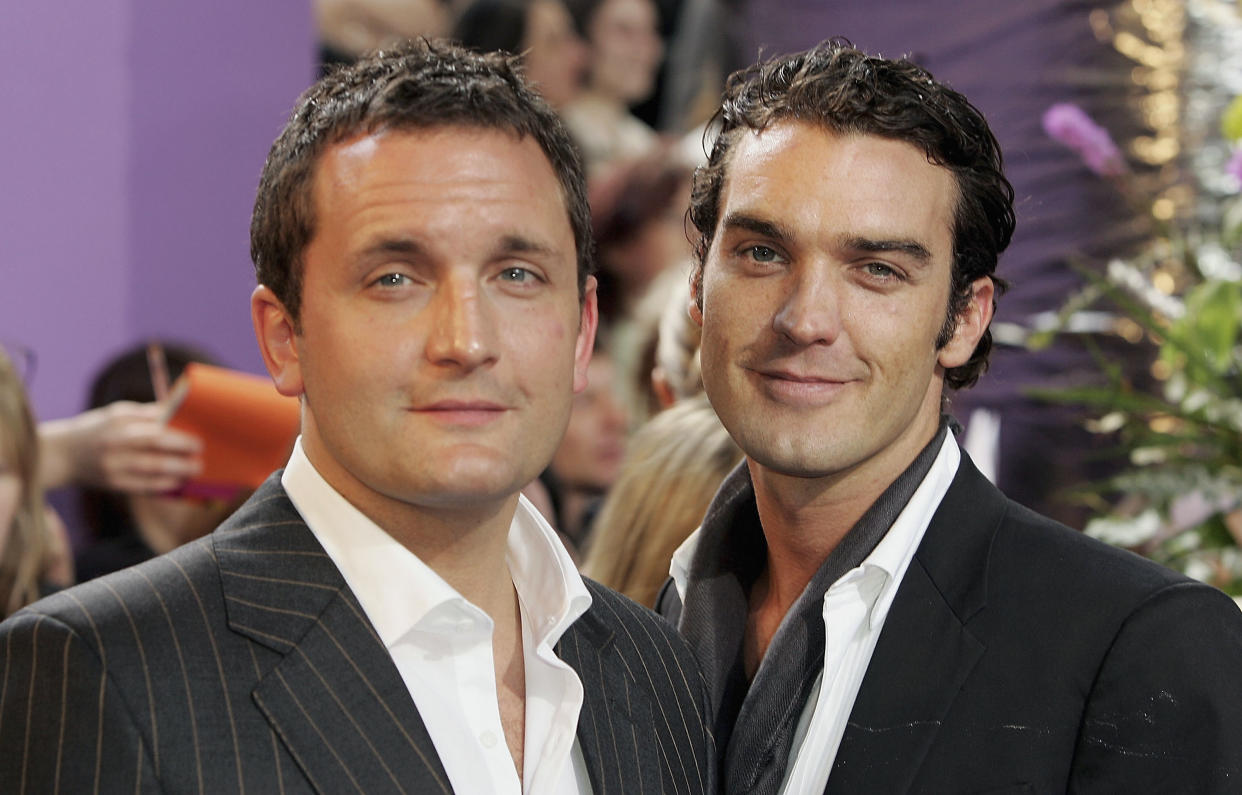 LONDON - MAY 7: Joel Beckett and Jake Maskell (R) arrive at the British Soap Awards 2005 at BBC Television Centre on May 7, 2005 in London, England. The annual awards recognise the best in British Soaps, with categories including Best Villain, Sexiest Male and Female, Best Actor and Actress and Best Soap. (Photo by Gareth Cattermole/Getty Images) 