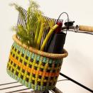 <p>goodeeworld.com</p><p><strong>$90.00</strong></p><p>Biking will be an entirely new experience with this handwoven basket, crafted in Ghana. The leather straps — complete with brass buckles — adjust, so that it can be positioned perfectly for an enjoyable ride. </p>