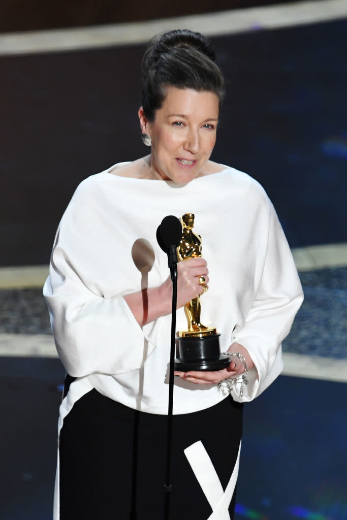 Jacqueline Durran holding her Oscar