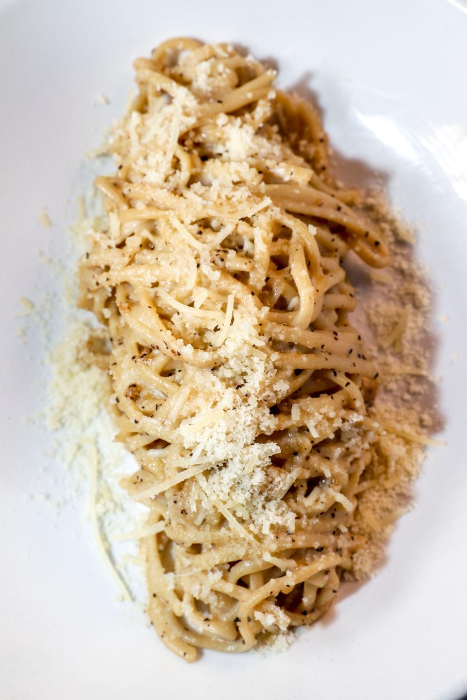 Tavolino on the east side gives the classic Italian pasta dish cacio e pepe (pecorino, black pepper, butter and spaghetti) a slight twist with garlic confit.