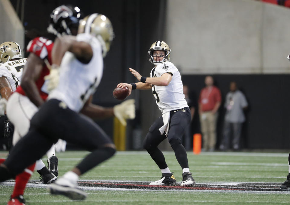 Brees to Thomas for the record: Saints quarterback Drew Brees set the NFL record for pass completions on Sunday. (AP)