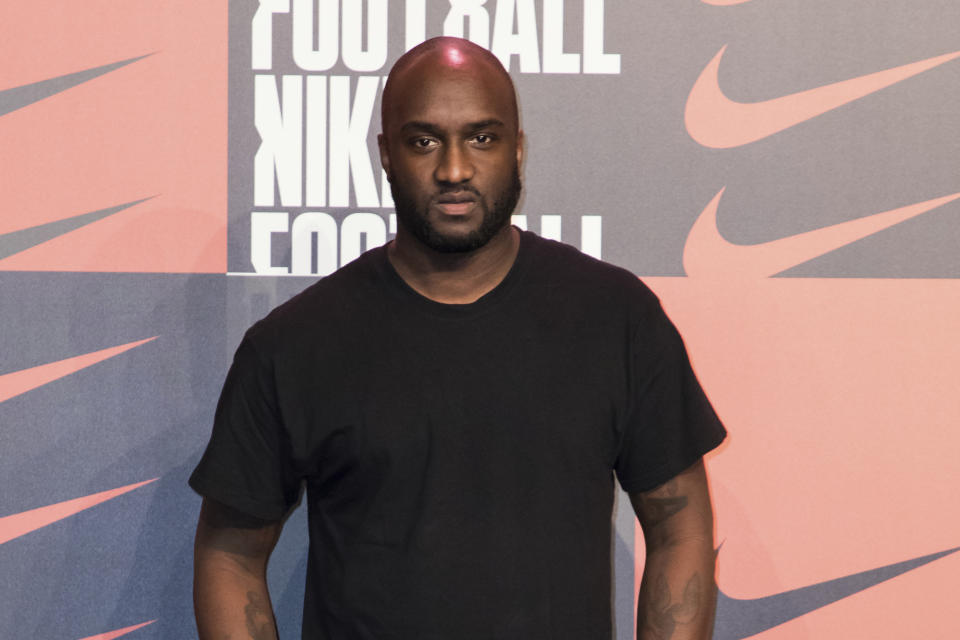 FILE - Virgil Abloh poses for photographers upon arrival at the Nike Celebrates The Beautiful Game event, in London on Wednesday, Feb. 7, 2018. Abloh, a leading fashion executive hailed as the Karl Lagerfeld of his generation, has died after a private battle with cancer. He was 41. Abloh’s death was announced Sunday, Nov. 28, 2021 by LVMH Louis Vuitton and the Off White label, the brand he founded. (AP Photo/Vianney Le Caer/File)