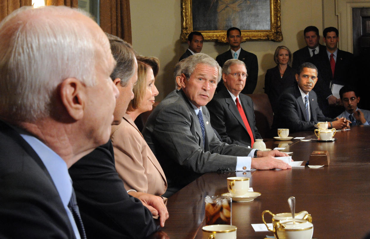 President George W. Bush makes remarks about the economic crisis during a meeting at the White House with members of Congress, including presidential candidates Sen. John McCain and Sen. Barack Obama, on Sept. 25, 2008. (Photo: Tim Sloan/AFP/Getty Images)