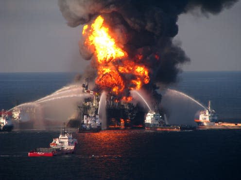 <span class="caption">Automation could help us avoid future disasters</span> <span class="attribution"><a class="link " href="https://commons.wikimedia.org/wiki/File:Deepwater_Horizon_offshore_drilling_unit_on_fire.jpg" rel="nofollow noopener" target="_blank" data-ylk="slk:US Coast Guard;elm:context_link;itc:0;sec:content-canvas">US Coast Guard</a></span>