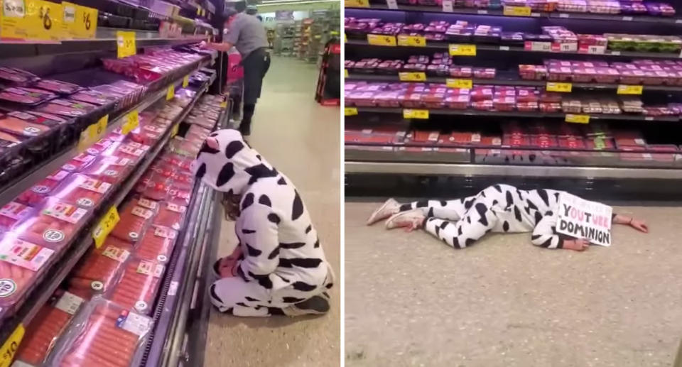 Photo of the woman gazing at the fridge before laying down in front of it holding a sign at the Woolworths store in Perth.