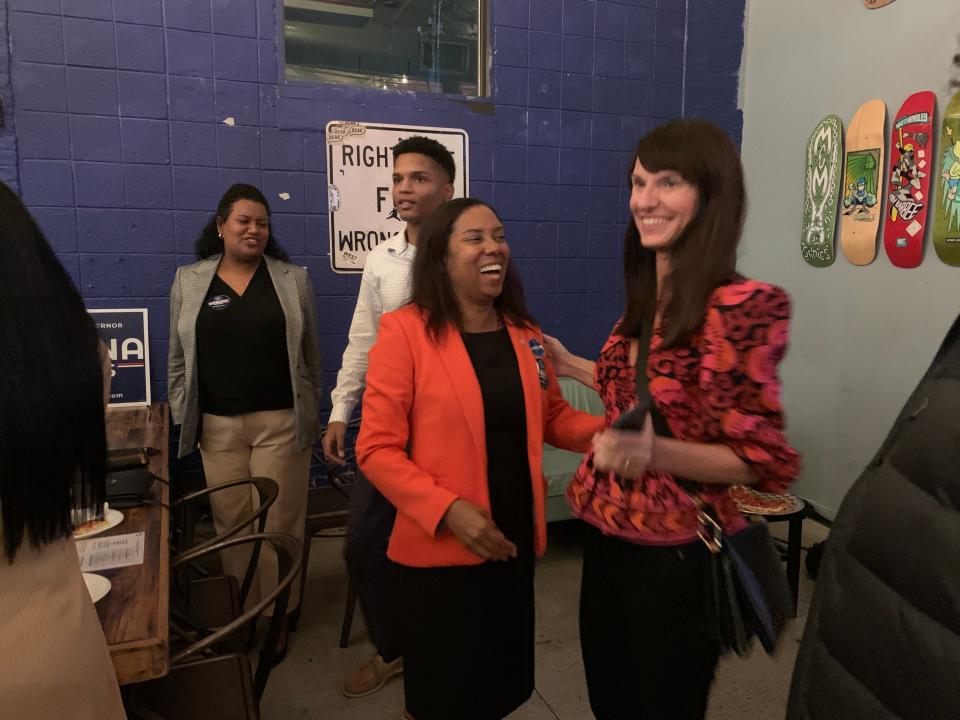 Sabina Matos laughs after declaring victory in the Democratic primary race for lieutenant governor on Tuesday at Revival Brewing in Providence.