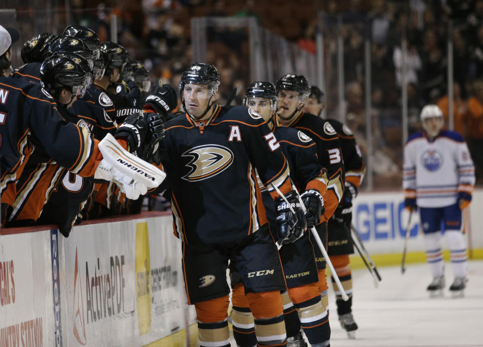 Anaheim Ducks&#39; Francois Beauchemin, center, celebrates his goal with teammates during the first period of an NHL hockey game against the Edmonton Oilers Wednesday, April 1, 2015, in Anaheim, Calif. (AP Photo/Jae C. Hong)