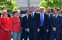 <p>President Donald Trump, third right, NATO Secretary General Jens Stoltenberg, center, and German Chancellor Angela Merkel walk through NATO headquarters at the NATO summit in Brussels on Thursday, May 25, 2017. US President Donald Trump and other NATO heads of state and government on Thursday will inaugurate the new headquarters as well as participating in an official working dinner. (AP Photo/Geert Vanden Wijngaert) </p>