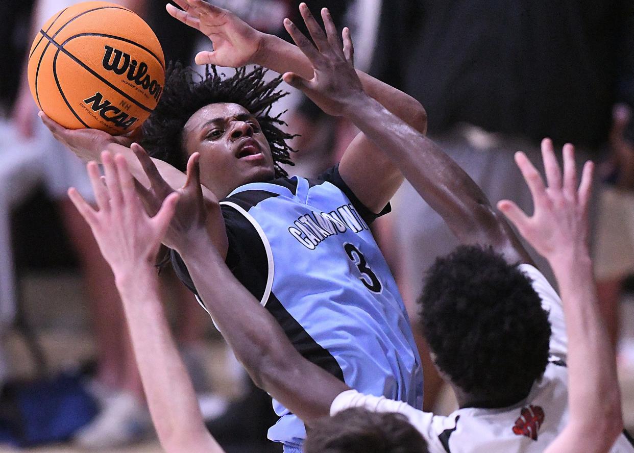 Panther Creek's #3 Chris Uwayo puts up a shot Friday March 8, 2024 at Brogden Hall in the regional semifinal. New Hanover won 63-6. KEN BLEVINS/STARNEWS
