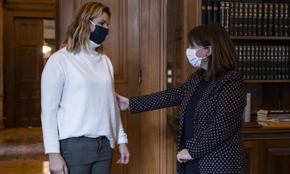 Greek president Katerina Sakellaropoulou welcomes Sofia Bekatorou at the presidential palace in Athens.