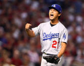 FILE PHOTO: Los Angeles Dodgers starting pitcher Yu Darvish reacts after striking out Arizona Diamondbacks right fielder J.D. Martinez in game three of the NLDS, October 9, 2017. Mark J. Rebilas-USA TODAY Sports