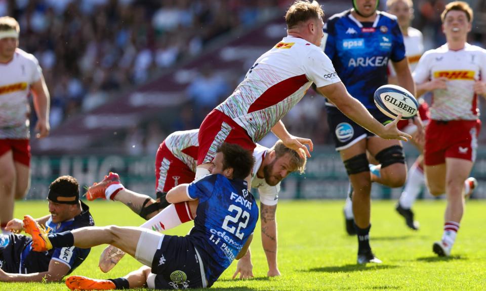 <span>Harlequins’ Alex Dombrandt is tackled by Yann Lesgourgues of Bordeaux Bègles. Rugby’s administrators are attempting to make the game safer while maintaining entertainment and excitement.</span><span>Photograph: Andrew Fosker/Shutterstock</span>