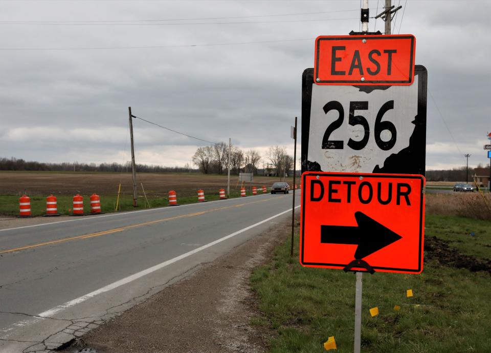 A detour sign directs eastbound traffic on Ohio 256 as the Ohio Department of Transportation begins construction on the intersection of Ohio 256 and Ohio 37 this week.