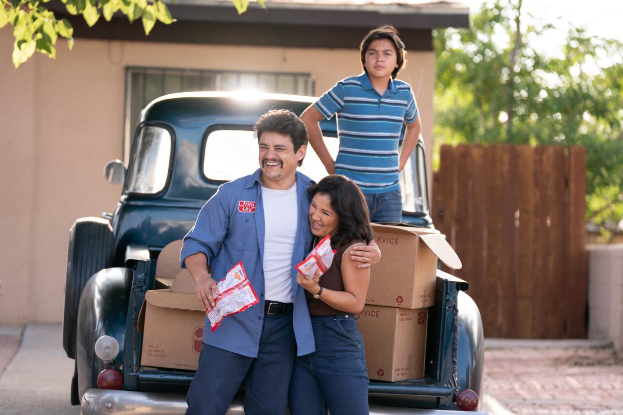 Jesse Garcia (Richard Montañez, from left), Annie Gonzalez (Judy Montañez) and Hunter Jones (Lucky Montañez) star in the new "Flamin' Hot" movie, directed by Eva Longoria.