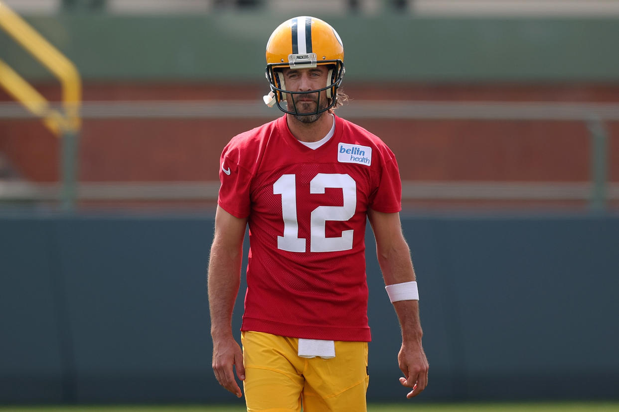 ASHWAUBENON, WISCONSIN - JULY 29: Aaron Rodgers #12 of the Green Bay Packers works out during training camp at Ray Nitschke Field on July 29, 2021 in Ashwaubenon, Wisconsin. (Photo by Stacy Revere/Getty Images)