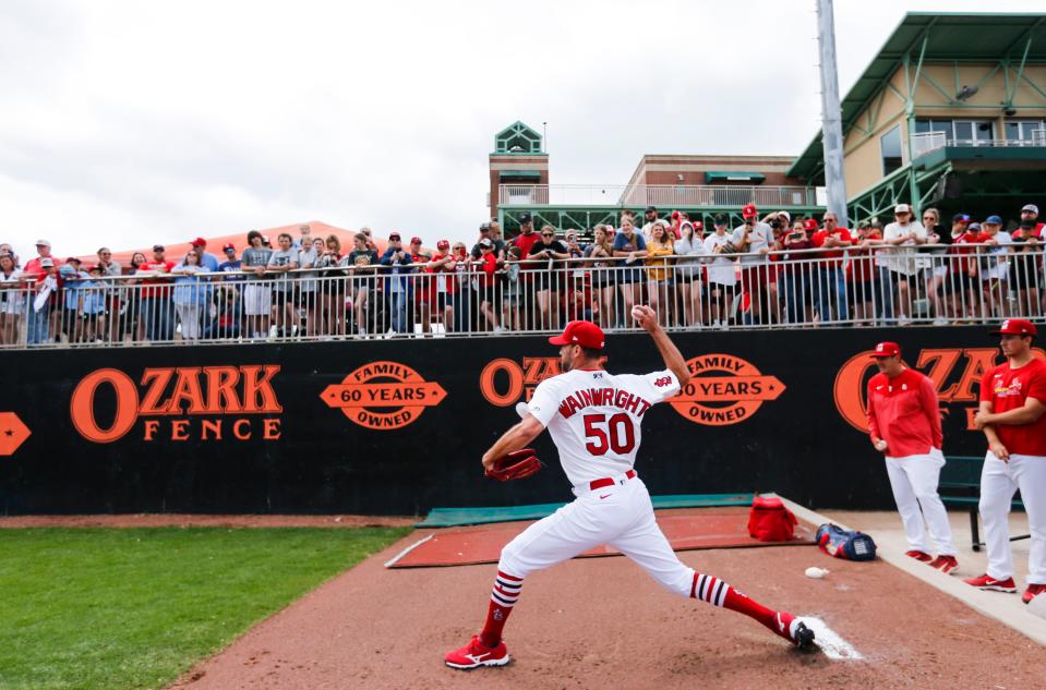 St. Louis Cardinals pitcher Adam Wainwright warms up in the bullpen before making a rehab appearance with the Springfield Cardinals at Hammons Field on Wednesday, April 19, 2023. 