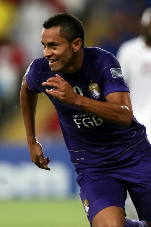 UAE's al-Ain club player Dynfres Douglas celebrates after scoring a goal against Qatar's el-Jaish club