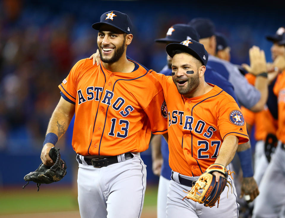 TORONTO, ON - SEPTEMBER 01:  Abraham Toro #13 and Jose Altuve #27 of the Houston Astros celebrate a no hitter by teammate Justin Verlander #35 at the end of the ninth inning during a MLB game against the Toronto Blue Jays at Rogers Centre on September 01, 2019 in Toronto, Canada.  (Photo by Vaughn Ridley/Getty Images)