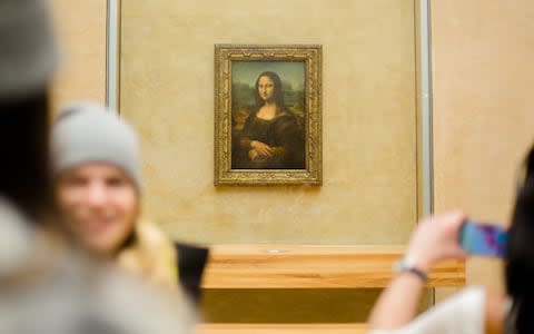 The Louvre, which houses the Mona Lisa, is one of the most visited attractions in the world - Credit: Getty