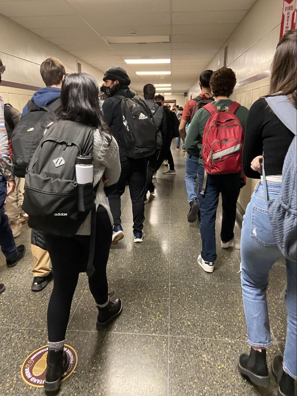 Students at Colonie Central High School in Albany, New York, crowd the hallways between class periods.