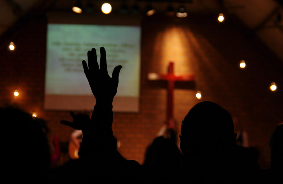 White evangelicals who attend church frequently are more likely than less frequent attenders to hold racist views, Robert Jones argues in a new book. (Photo: middelveld via Getty Images)