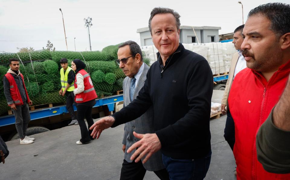 Lord Cameron at the at an aid distribution centre in El Arish