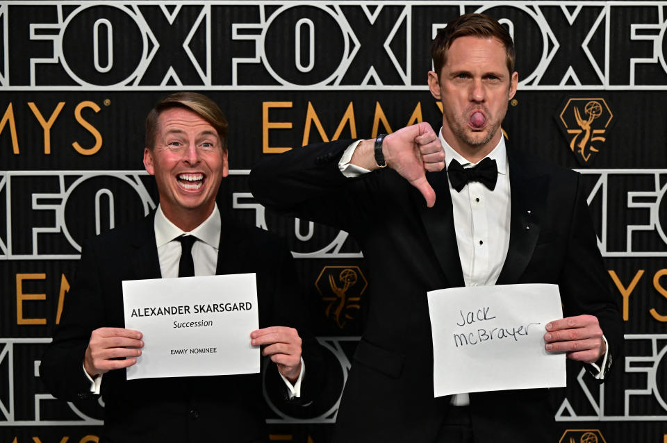 Alexander Skarsgard and Jack McBrayer arrive at the 75th Emmy Awards.  / Credit: FREDERIC J. BROWN/AFP via Getty Images