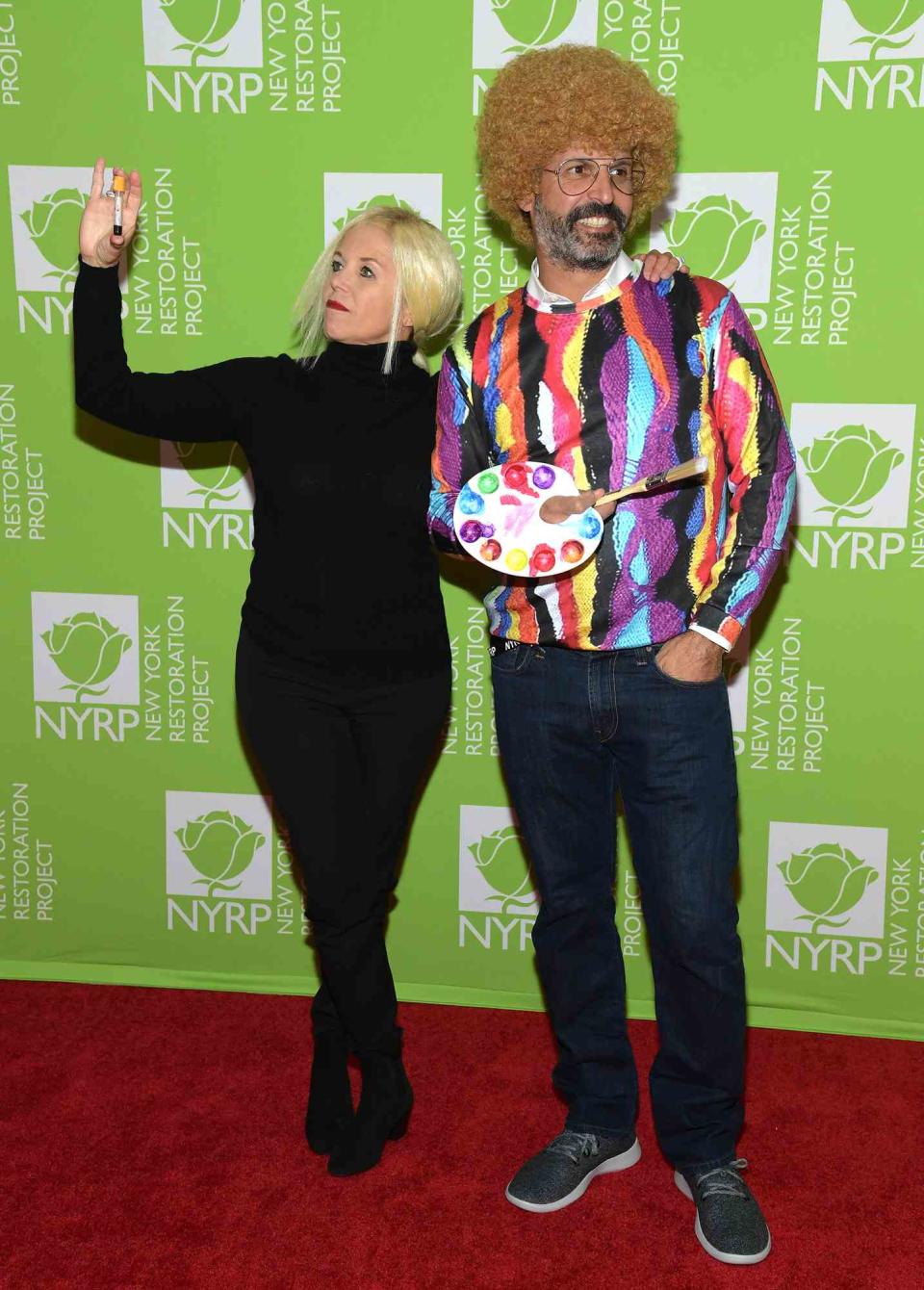 Katie Couric and John Molner attend Bette Midler's Hulaween To Benefit NY Restoration Project at New York Midtown Hilton on October 31, 2019 in New York City