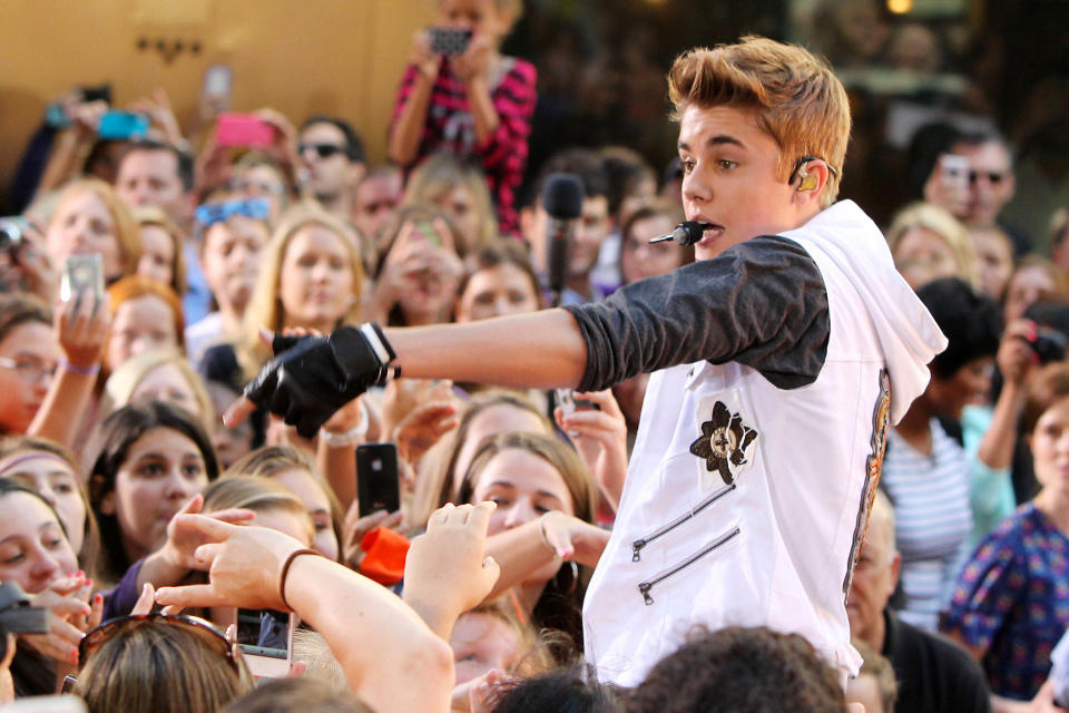 This image released by Starpix shows singer Justin Bieber performing on the "Today" show as part of their summer concert series in Rockefeller Center, Friday, June 15, 2012 in New York. (AP Photo/Starpix, Amanda Schwab)