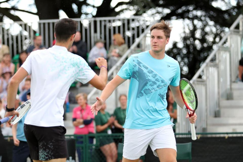 Julian Cash left and Henry Patten have won 14 doubles titles together this season (Isaac Parkin/PA) (PA Archive)