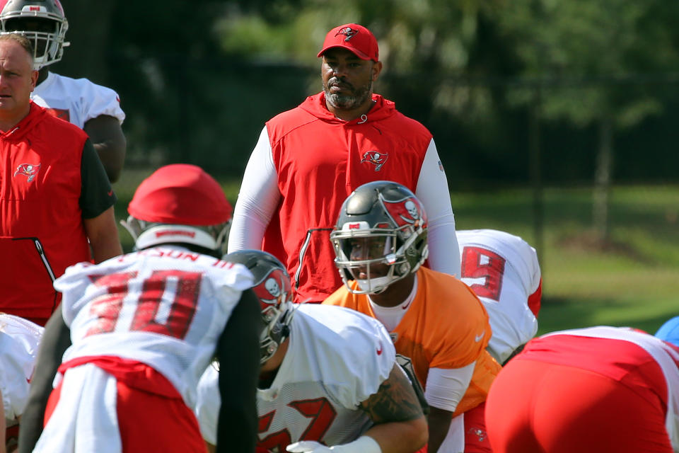 TAMPA, FL - JUNE 06:  Assistant Head Coach / Run Game Coordinator Harold Goodwin of the Tampa Bay Buccaneers watches the offensive drill during the Buccaneers Minicamp on June 06, 2019 at One Buccaneer Place in Tampa,FL. (Photo by Cliff Welch/Icon Sportswire via Getty Images)