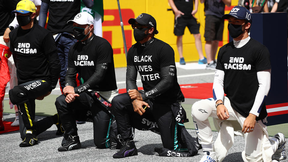 Lewis Hamilton and other F1 drivers are pictured taking a knee prior to the Styrian Grand Prix.