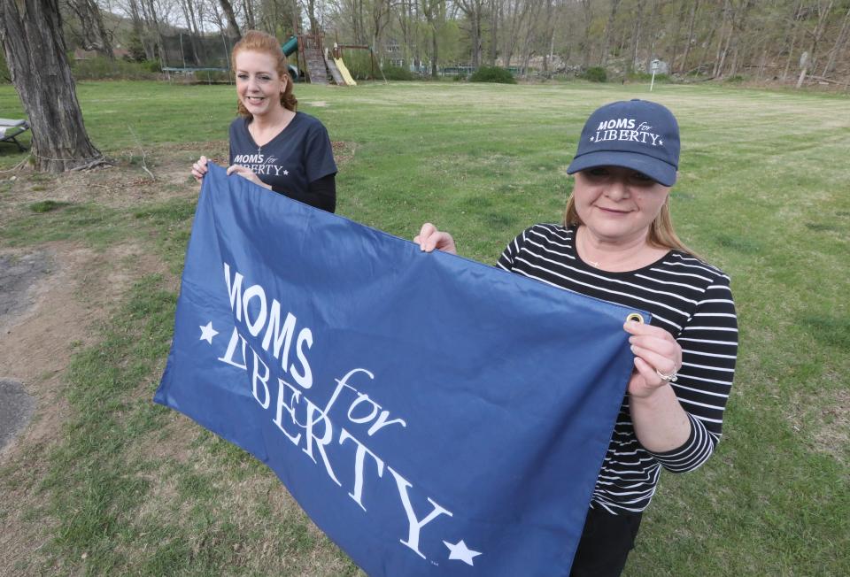 Abigail O'Brien, vice chair, left, and Crista Straub, chair of the Putnam County chapter of Moms for Liberty at Staub's Putnam Valley home May 5, 2022.