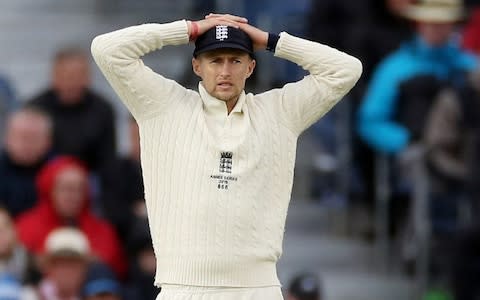 Joe Root reacts at Old Trafford - Credit: Reuters