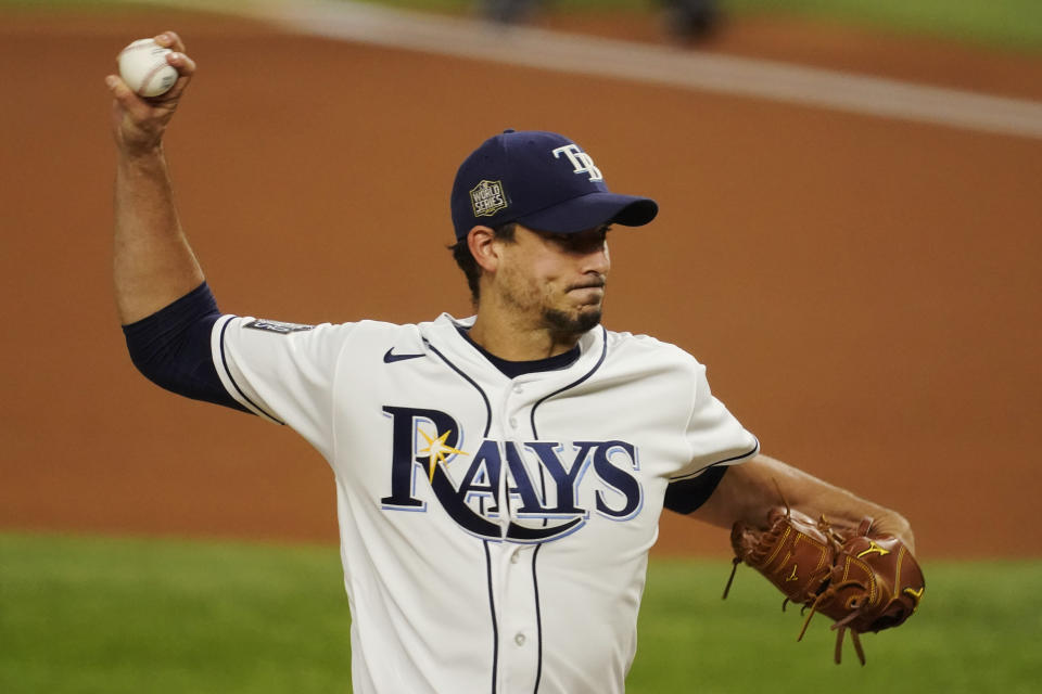 Tampa Bay Rays starting pitcher Charlie Morton throws against the Los Angeles Dodgers during the first inning in Game 3 of the baseball World Series Friday, Oct. 23, 2020, in Arlington, Texas. (AP Photo/Tony Gutierrez)