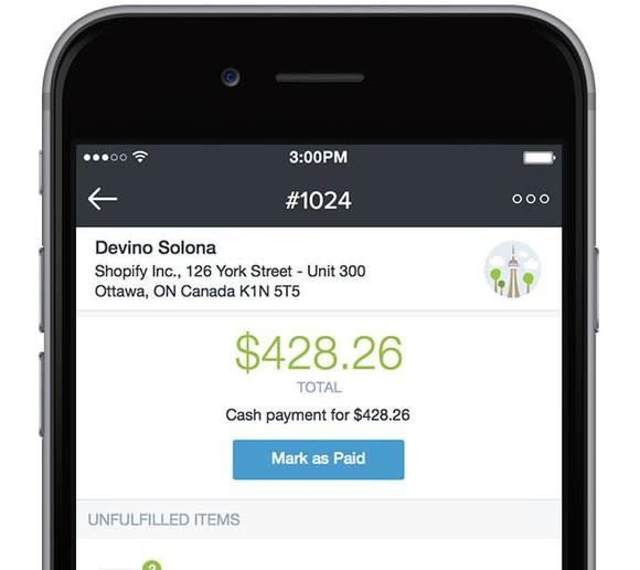 A Shopify transaction in process on a smartphone app.