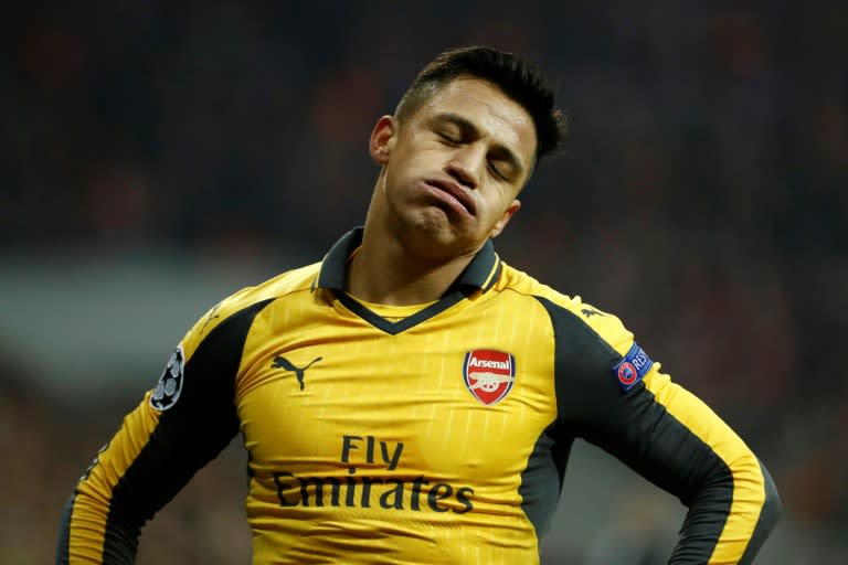 This file photo taken on February 15, 2017 shows Arsenal's Chilean striker Alexis Sanchez reacting during the UEFA Champions League round of sixteen football match between FC Bayern Munich and Arsenal in Munich, southern Germany, on February 15, 2017