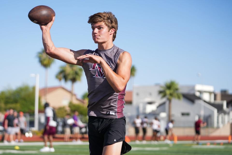 Desert Mountain quarterback Drew Tapley runs drills during a spring football showcase at Saguaro High School on Thursday, May 19, 2022, in Scottsdale.