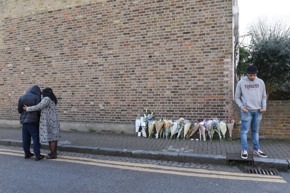 Floral tributes are left for a victim of knife crime in London (PA)