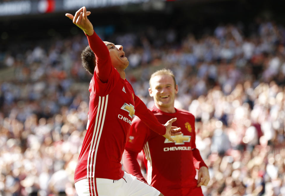 Football Soccer Britain - Leicester City v Manchester United - FA Community Shield - Wembley Stadium - 7/8/16 Manchester United's Jesse Lingard celebrates with Wayne Rooney after scoring their first goal Action Images via Reuters / John Sibley Livepic EDITORIAL USE ONLY. No use with unauthorized audio, video, data, fixture lists, club/league logos or "live" services. Online in-match use limited to 45 images, no video emulation. No use in betting, games or single club/league/player publications. Please contact your account representative for further details.