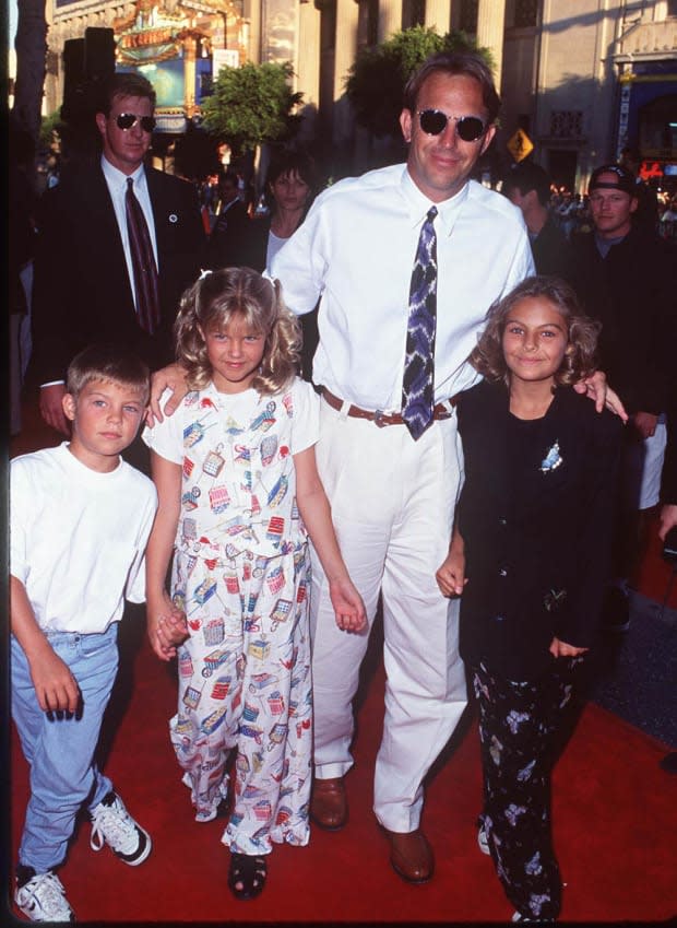 <p>Kevin Costner and his children Lily, Annie and Joe at the premiere of the film <em>Waterworld</em>. </p>