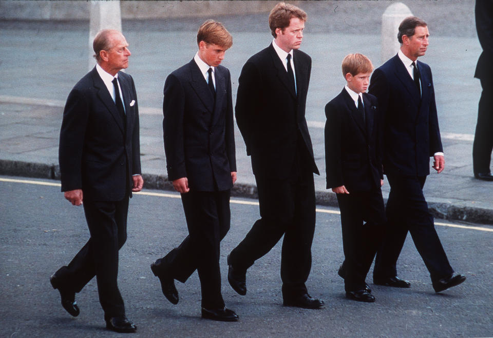 Prince Philip, the Duke of Edinburgh, Prince William, Earl Spencer, Prince Harry and Prince Charles, the Prince of Wales follow the coffin of Diana, Princess of Wales, London, England, September 6, 1997. The funeral took place seven days after she was killed in an automobile accident in Paris. Members of the royal family walked in the procession behind the coffin, as did 500 representatives of the charities associated with the Princess.  At least a million people lined the streets of central London to watch the procession from Kensington Palace to Westminster Abbey.   (Photo by Anwar Hussein/Getty Images)