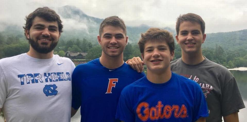 The four Maye brothers from left to right: Luke (the oldest), Cole, Drake and Beau. The oldest three brothers are all at least 6-foot-7. Drake is 6-foot-4. This photo was taken in the summer of 2017, with the Florida Gators paraphernalia thanks to Cole, who pitched for the Gators. Scott Fowler/sfowler@charlotteobserver.com