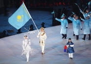 <p>Flag bearer Abzal Azhgaliyev of Kazakhstan leads the team during the Opening Ceremony of the PyeongChang 2018 Winter Olympic Games at PyeongChang Olympic Stadium on February 9, 2018 in Pyeongchang-gun, South Korea. (Photo by Ronald Martinez/Getty Images) </p>