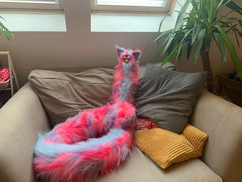 The long Furby in their friend's home.