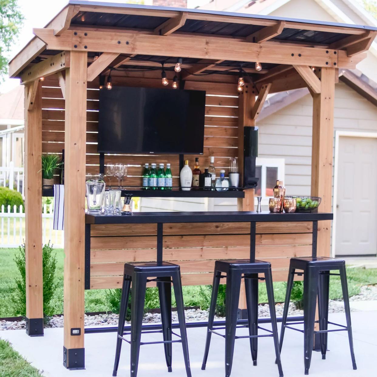 <p><a href="https://go.redirectingat.com?id=74968X1596630&url=https%3A%2F%2Fwww.samsclub.com%2Fp%2Fbackyard-discovery-cedar-springs-outdoor-bar%2FP03022111%3Fpid%3Daff_rak%26siteID%3DTnL5HPStwNw-QDv0_ZGOfHxejcCskQRb4A%26ranMID%3D38733%26ranEAID%3DTnL5HPStwNw%26ranSiteID%3DTnL5HPStwNw-QDv0_ZGOfHxejcCskQRb4A%26pubNAME%3DSkimlinks.com&sref=https%3A%2F%2Fwww.housebeautiful.com%2Fshopping%2Ffurniture%2Fa61639775%2Fsams-club-is-selling-costco-viral-bar-shed%2F" rel="nofollow noopener" target="_blank" data-ylk="slk:Shop Now;elm:context_link;itc:0;sec:content-canvas" class="link rapid-noclick-resp">Shop Now</a></p><p>Cedar Springs Outdoor Bar</p><p>samsclub.com</p><p>$999.00</p><span class="copyright">Sam's Club</span>