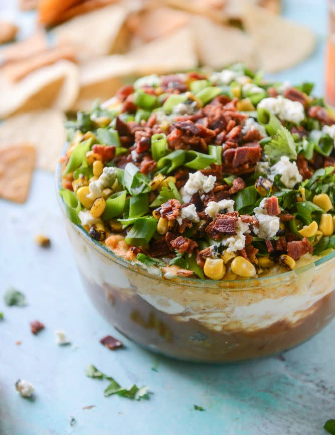 <p>Dip your chips, crackers or veggies into seven layers of rich flavor.</p><p><em><a href="http://www.howsweeteats.com/2016/05/layered-buffalo-chicken-dip/" rel="nofollow noopener" target="_blank" data-ylk="slk:Get the recipe from How Sweet It Is »;elm:context_link;itc:0;sec:content-canvas" class="link ">Get the recipe from How Sweet It Is »</a></em><br></p>