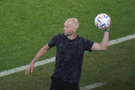 head coach Gregg Berhalter of the United States holds a ball during the World Cup group B soccer match between Iran and the United States at the Al Thumama Stadium in Doha, Qatar, Tuesday, Nov. 29, 2022. (AP Photo/Luca Bruno)