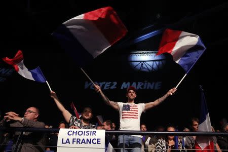 Supporters for Marine Le Pen, French National Front (FN) political party leader and candidate for French 2017 presidential election, attend a campaign rally in Nice, France, April 27, 2017. REUTERS/Eric Gaillard